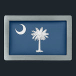 Gürtelschnalle mit Fahne South Carolina Staat<br><div class="desc">Fügen Sie Ihrem Kleiderschrank eine Touch von Südcharme mit diesem stilvollen Gürtelschnalle mit der Flagge von South Carolina hinzu! Dieser Gürtelschnalle, der aus langlebigen Materialien gefertigt und mit dem ikonischen Palmenbaum und dem halbmondförmigen Design der Fahne von South Carolina geschmückt ist, ist sowohl ein Modestatement als auch ein Symbol für...</div>