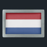 Gürtelschnalle mit Flagge der Niederlande<br><div class="desc">Steigern Sie Ihren Stil mit unserem markanten Gürtelschnalle mit der Flagge der Niederlande! Mit viel Liebe zum Detail gestaltet, präsentiert dieser Gürtelschnalle stolz die ikonische Dreisfarbenflagge der Niederlande. Die Fahne besteht aus drei horizontalen Bändern gleicher Größe - oben rot, in der Mitte weiß und unten blau. Diese Farbtöne sind ein...</div>