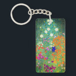 Gustav Klimt Flower Garden Schlüsselanhänger<br><div class="desc">Schlüsselanhänger mit Gustav Klimts Ölgemälde Blumengarten (1906). Ein schöner Garten mit lila,  roten,  weißen,  blauen und orangefarbenen Blume. Ein großartiges Geschenk für Jugendliche und österreichische Kunstliebhaber.</div>
