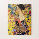 Gustav Klimt Lady mit Fan Puzzle<br><div class="desc">Puzzle mit Gustav Klimts Ölgemälde Lady mit Fan (1918). Eine Frau,  die einen blauen Kimono trägt,  hält einen roten Fan vor einem bunten,  gelben Hintergrund von Blume und Pfauen. Ein großartiges Geschenk für die Fans von Japonisme und europäischer Kunst.</div>