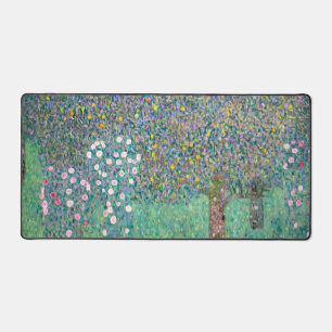 Gustav Klimt - Rosen unter Bäumen Schreibtischunterlage