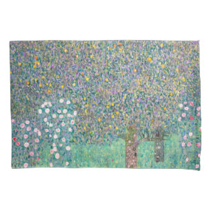 Gustav Klimt - Rosenbüsche unter den Bäumen Kissenbezug