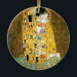 Gustav Klimt The Kiss Keramik Ornament<br><div class="desc">Gustav Klimt Die Vintage Jugendstil-Malerei Der Kuss wurde zwischen 1907 und 1908, dem Höhepunkt seiner Goldenen Periode, vom österreichischen Symbolik-Maler Gustav Klimt gemalt, als er eine Reihe von Werken in einem ähnlich vergoldeten Stil malte. Das Gemälde gilt weithin als Meisterwerk der frühen Moderne. Es ist ein Symbol des Wiener Jugendstils...</div>