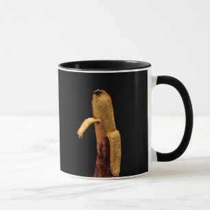 Halb geschälte Banane Stillleben Tasse