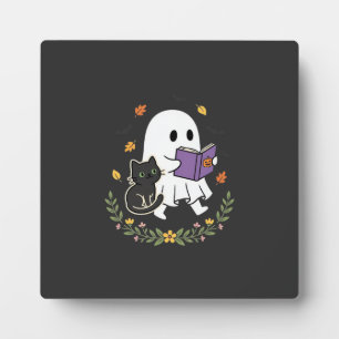 Halloween-Geisterkatze liest Buch Florales Design_ Fotoplatte