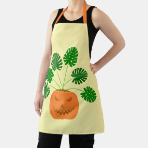 Halloween Monstera Pflanze in Pumpkin Schürze