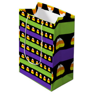 Halloween-Muster mit Candy Corn in Grün und Lila S Mittlere Geschenktüte