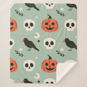 Halloween nahtloses Muster mit Raben, Schädeln und Sherpadecke