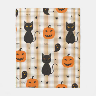 Halloween nahtloses Muster mit schwarzer Katze und Fleecedecke