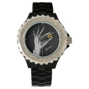 Hand mit einem Radiationssymbol Armbanduhr