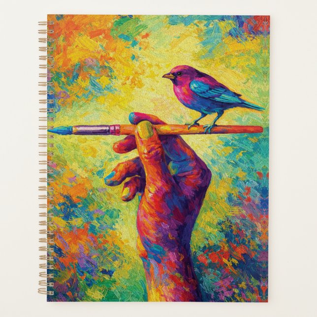 Hand mit Pinsel und kreativem Vogel Planer (Vorderseite)