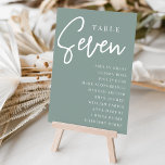 Hand Scripted Table SEVEN   Guest Names Tischnummer<br><div class="desc">Einfache und schicke Tischnummer-Karten in Eukalyptus Grün und Weiß geben bei Ihrer Hochzeit oder Veranstaltung eine elegante Note. Das Design enthält "Table [number]" in einem spannenden Mix aus klassischer Serif und handgeschriebenem Skriptsatz, darunter einzelne Gastnamen. Design wiederholt sich auf beiden Seiten. Einzelne nummerierte Karten werden separat verkauft; bestellen Sie jede...</div>