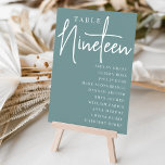 Hand Scripting Table NINETEEN   Guest Names Tischnummer<br><div class="desc">Einfache und schicke Tischnummer-Karten in staubigen aquamarinen und weißen Farbtönen geben bei Ihrer Hochzeit oder Veranstaltung eine elegante Note. Das Design enthält "Table [number]" in einem spannenden Mix aus klassischer Serif und handgeschriebenem Skriptsatz, darunter einzelne Gastnamen. Design wiederholt sich auf beiden Seiten. Einzelne nummerierte Karten werden separat verkauft; bestellen Sie...</div>