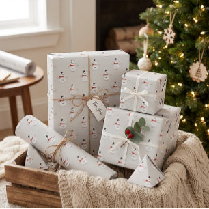 Handgezeichneter Schneemann auf grauem Winterverpa Geschenkpapier