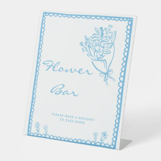 Handgezeichnetes Baby in Bloom Blumenbar-Schild Sockelschild