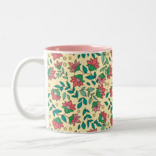 Handgezeichnetes Muster aus gepressten Blumen und Zweifarbige Tasse