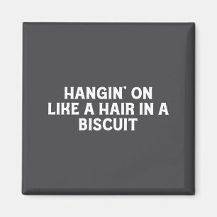 Hängt wie ein Haar in einer süßen südlichen Komödi Magnet