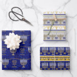 Hanukkah Gold Menorah Monogramm Chic-Sortiment Geschenkpapier Set<br><div class="desc">Erstellen Sie Ihre eigenen eleganten Hanukkah Packpapier-Blätter mit diesem Sortiment von antiken Gold Menorah Muster und Streifen, die leicht zu personalisieren mit Ihrem Monogramm Initial für eine Art Geschenkpapier. Blatt eins hat ein Allover Muster meiner ursprünglichen Imitate Gold Menorah Kunstwerk auf einem Imitat blauen Glitzer Hintergrund. Zwischen dem Raum für...</div>