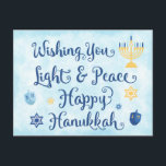 Hanukkah Licht und Frieden Feiertagspostkarte<br><div class="desc">Eine jüdische Hanukkah-Theme-Karte mit einer Menorah, Stern von David und Driedel. Der Text lautet "Wishing You Light & Peace Happy Hanukkah. Der Hintergrund ist eine hellblaue Aquarellwäsche. Personalisieren Sie den Rücken mit Ihrer eigenen Nachricht und/oder Ihrem Firmenlogo. Diese Postkarten sind eine kostengünstige Möglichkeit, Ihre Feiertagsgrüße zu senden, ohne die Bank...</div>