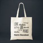 HANUKKAH | Love Joy Peace | HEBREW Tragetasche<br><div class="desc">Stylish HANUKKAH TOTE BAG with LOVE JOY PEACE including Hebrew translations in black typography. Text is CUSTOMIZABLE,  in case you wish to change anything. HAPPY HANUKKAH is also customizable. Part of the HANUKKAH Collection. Matching items are available.</div>