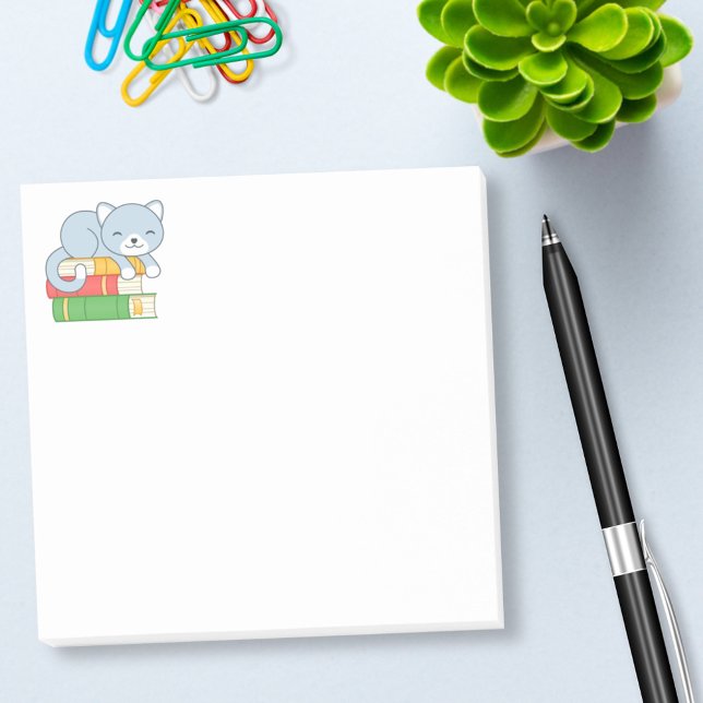 Happy Cat auf einem Buchstapel Post-it Klebezettel (Von Creator hochgeladen)