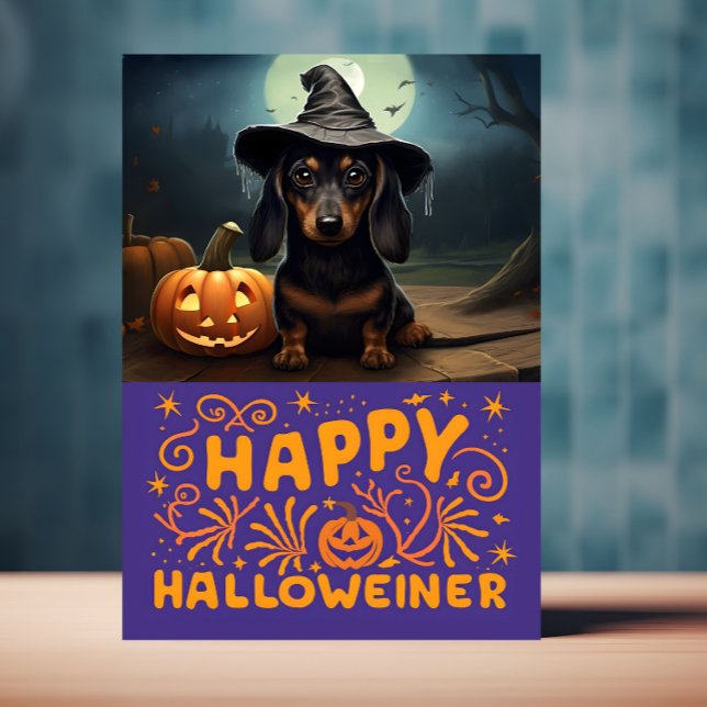 Happy Halloweiener Niedlicher Hund Karte (Halloween card with Weiner dog on front is displayed on a table top)