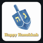 Happy Hanukkah Dreidel Quadratischer Aufkleber<br><div class="desc">Gold Happy Hanukkah Text mit einem blauen dreiel.</div>