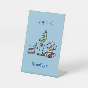 Happy niedliche Roboter Trio-Cartoon Sockelschild