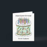 Happy Oaster Birthday to Husband Karte<br><div class="desc">Eine Illustration eines weißen Geburtstagskuchens,  der mit Kerzen geschmückt ist,  und Bildern von Brüsten und Karotten an den Seiten. Die Worte 'Happy Oaster Birthday to my Husband' begleiten das Bild,  das einen knackigen weißen Hintergrund hat.</div>