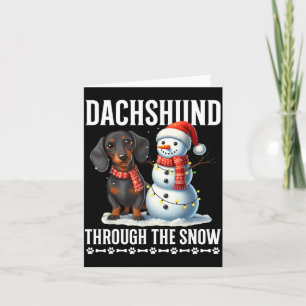 Hässlicher Dachshund Weihnachten durch den Schnee Karte