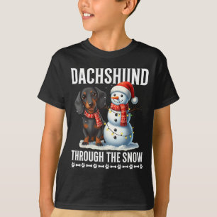 Hässlicher Dachshund Weihnachten durch den Schnee T-Shirt