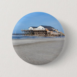 Haus auf Pfählen am Strand von St. Peter Ording Button