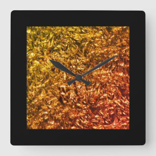 Heated foil on black quadratische wanduhr