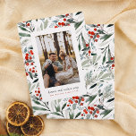 Heaven & Nature Sing Classic Christmas Photo Feiertagskarte<br><div class="desc">An elegant and minimalist design, with a backdrop of hand-painted holly, watercolor berries, pine, and lush botanical greenery, creates a classic and timeless atmosphere that captures the essence of the season. The design showcases a custom photo of your choice inside a minimal white frame. Below the photo, "heaven and nature...</div>