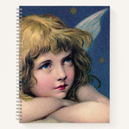Heavenly angel daydreaming on a cloud in the sky notizbuch