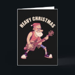 Heavy Christmas Rock Santa Karte<br><div class="desc">Weihnachts-T - Shirt-Design mit einer Illustration eines coolen Santa-Rocking mit einer Hirschgitarre und der Aufschrift "Heavy Christmas". Für Fans von Heavy Metal und Rock ein großartiges X-Mas-Geschenk</div>