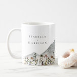 HEIDI Watercolor Wildblume Hochzeitsgeschenk Kaffeetasse<br><div class="desc">Diese Keramik Kaffee-Tasse bietet rauchende Wasserfarbenberge mit farbenfrohen,  farbenfrohen Wildblumen. Ändern Sie einfach die Namen Ihrer Lieblingsbraue und Bräutigam und fügen Sie ihr Datum und ihre Position auf der anderen Seite für ein besonderes und einzigartiges Geschenk.</div>