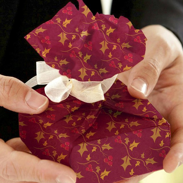 Heilige goldene Heilige und rote Beeren auf tiefro Seidenpapier (Von Creator hochgeladen)