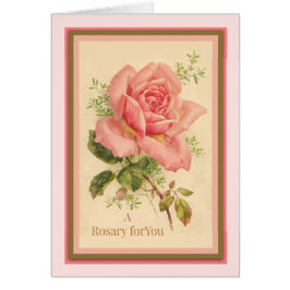 Heiliges Rosenbeet mit rosa Rosen Gebet