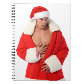 Heiße Guy posiert sexy Santa Hut Outfit Notizblock