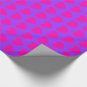 Heißes Rosa-Herzen auf Lila Geschenkpapier