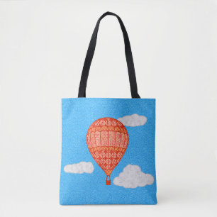 Heißluftballon, Korallenorange gegen einen blauen 