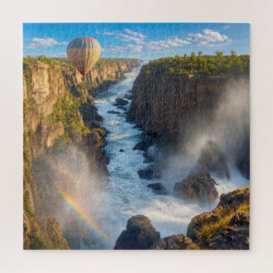 Heißluftballon schwebt über einer Schlucht Puzzle