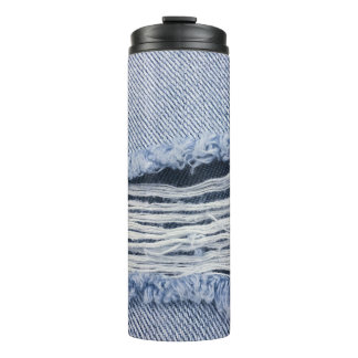 Hellblaue zerrissene Jeans-Textur Thermosbecher
