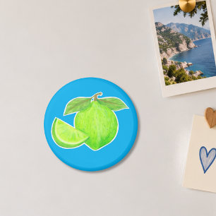 Helle, blattgrüne Limette auf blauem Zitrus Magnet