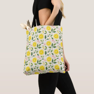 Helle gelbe Sommerlemonen und Blumen