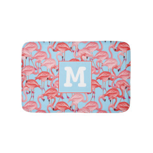 Helle rosa Flamingos auf Blau addieren Ihre Badematte