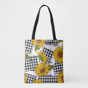 Helle Sonnenblumen-Blume auf karierten Pflastern.