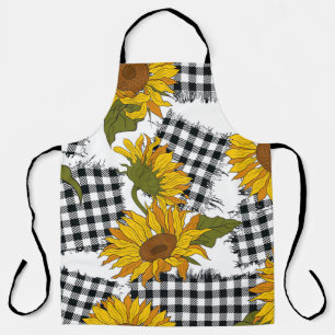 Helle Sonnenblumenblüten auf karierten Flecken. Me Schürze