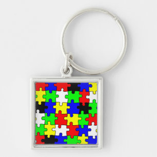 Helle und farbenfrohe Puzzleteile Schlüsselanhänger